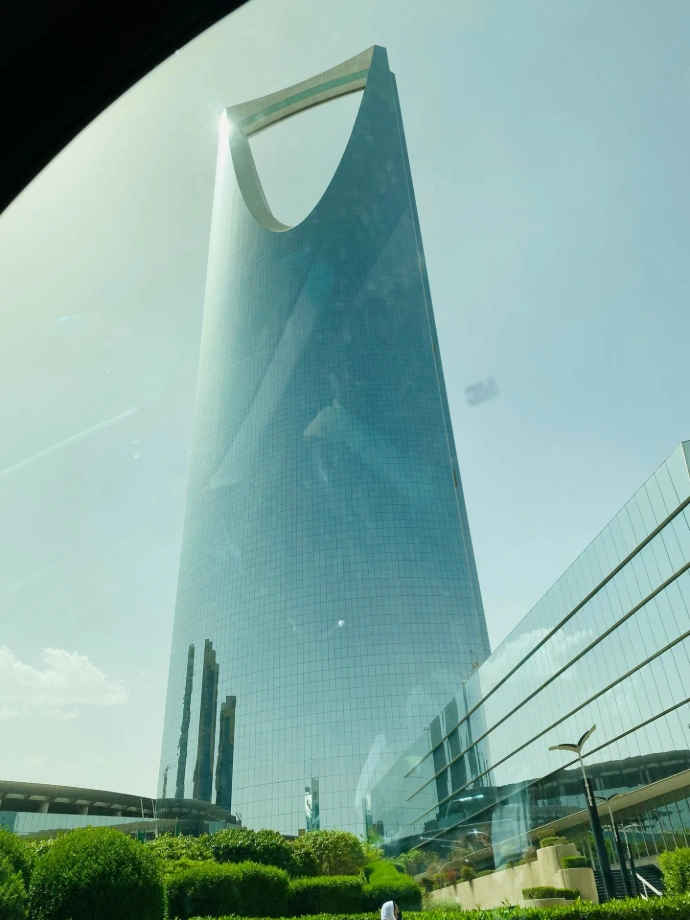 a tall building with glass walls